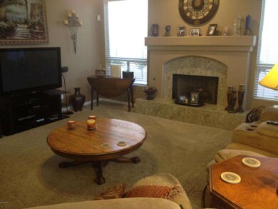 Family Rm w/Granite Cased Fireplace