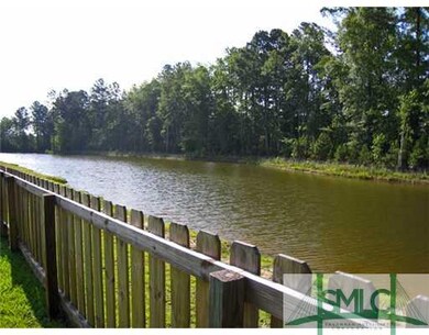 Yard/Garden. View of Lagoon and wooded buffer from