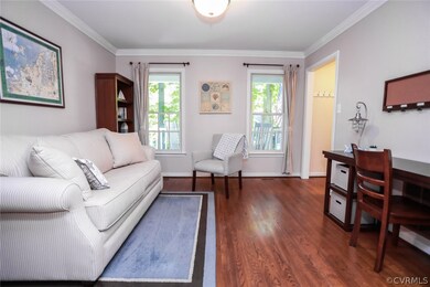 Formal Living Room with Hardwood Flooring and Crow
