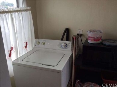 Interior laundry room off kitchen.