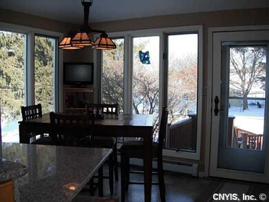 Kitchen side door off the kitchen eating area lead