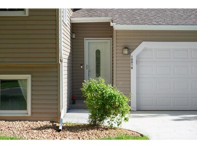 Concrete driveway, apron and landscaping updated i