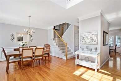Spacious open concept foyer into dining room.