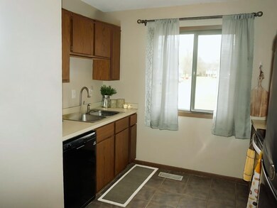 6639 84th - Kitchen features large window providing ample natural sunlight. Above cabinet platform is ideal for showcasing decor or additional storage for small kitchen appliances.