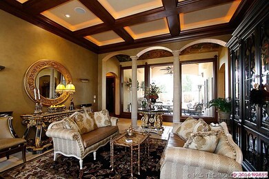 Boxed beamed ceilings in formal living with views
