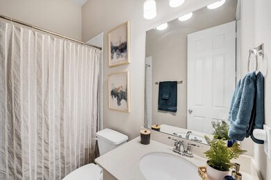 Secondary bathroom shared between 2 of the secondary rooms