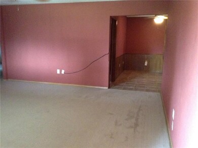 From this view, you can see into the dining area, 