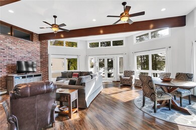 New luxury vinyl floors and beautiful brick accent