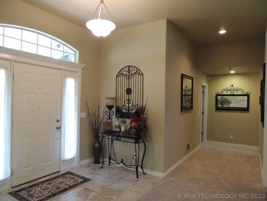 The front entry opens to the family room, down the
