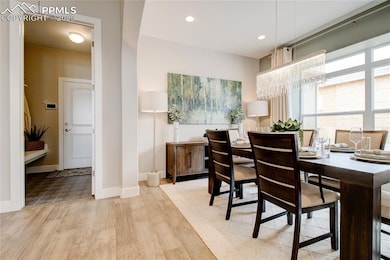Dining area featuring light hardwood / wood-style 