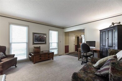 This sitting room is perfect for a piano, a family