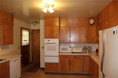 Kitchen with newer oven and dishwasher