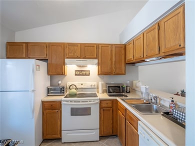 5857 Rattlesnake Hamm Rd unit 204, Naples, FL 34113 - photo 2