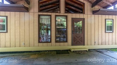 Main entrance under roof.