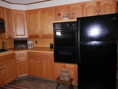 Kitchen kitchen with built in gas oven and refrige