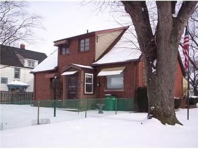 Exterior Back. Brick exterior, new roof in the Fal