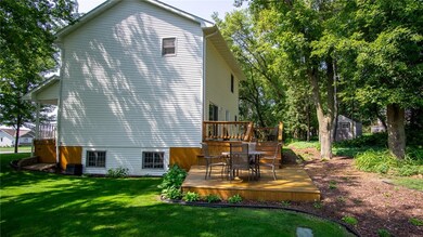 Tiered deck off the back of the house is a great quiet place to relax and enjoy the manicured lawn!