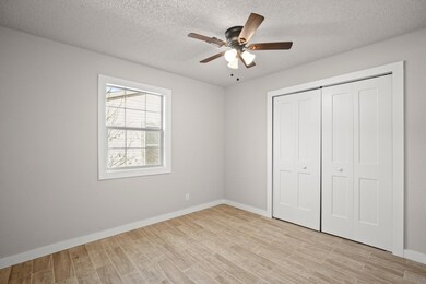 Unfurnished bedroom featuring light wood finished