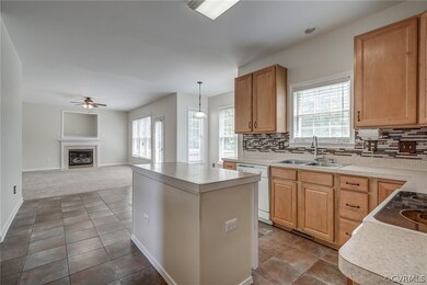 Eat-in Kitchen with Tile Floors, Pantry and Island