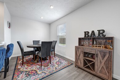 This cozy dining area features a space for breakfa