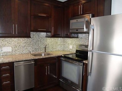Custom Mosaic Tile Backsplash, undercounter lighti