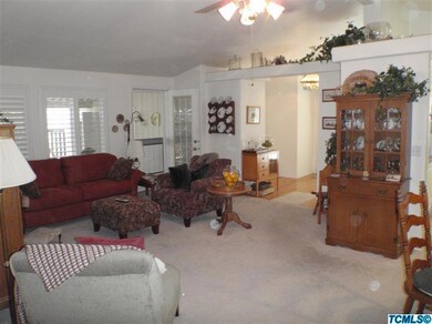 Living room space towards wood floor ent