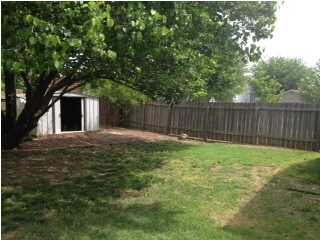 Fenced Yard with Shed