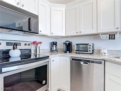 Kitchen featuring stainless steel appliances and w