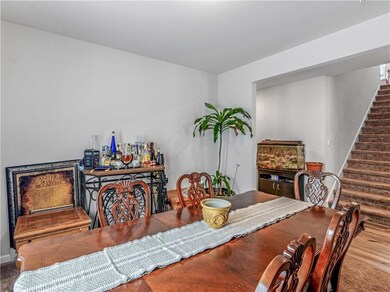 Dining area featuring hardwood / wood-style floori