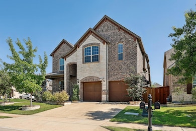 View of front of property with a garage and a fron
