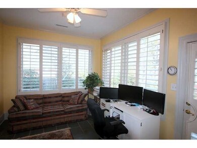 Sunroom off the Dining room has ceiling fan, tile 