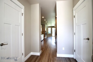 Entry way, half bath off to left, garage to right,