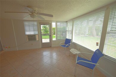Access to the fenced back yard and patio from the