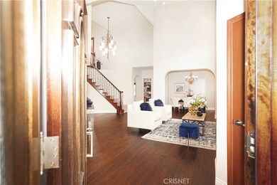 Enter into wood floors and high ceilings