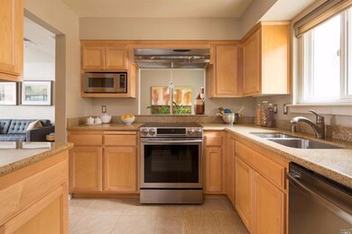 Gourmet kitchen with granite counters, newer profe