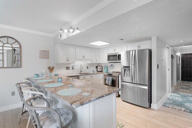 Kitchen featuring appliances with stainless steel 