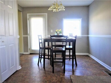 Dining area with kitchen garden box window