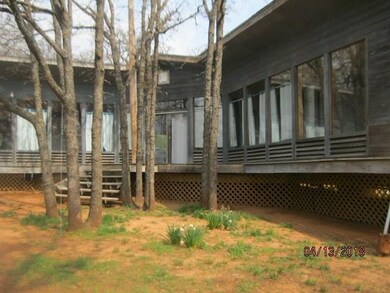 Full deck across south side of home.