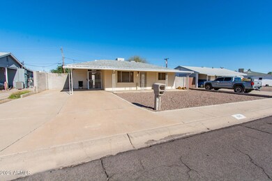 Front House . Carport