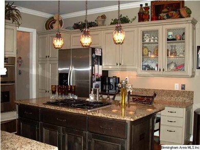 Another view of the kitchen with gas cooktop in is