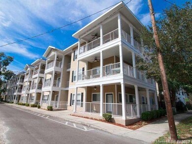 3rd floor corner condo with wrap around balcony