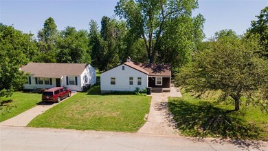 View of front of property with a front lawn