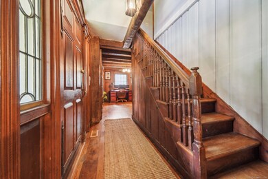 Center hall colonial invites you into the beautiful woodworking of this home