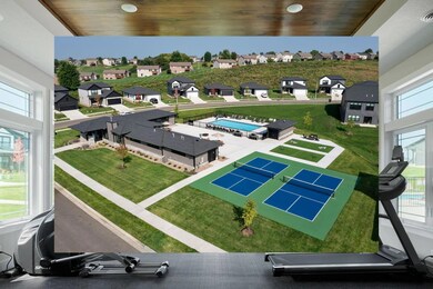 2127 Preserve Dr NW West Circle - Aerial Shot of Clubhouse and Pickelball courts.jpg