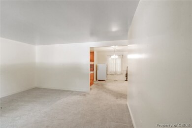 Empty room featuring carpet floors