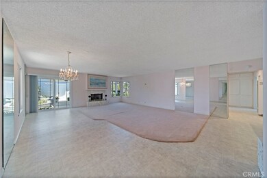 LARGE LIVINGROOM WITH DUAL PANE WINDOWS, GAS FIREPLACE.