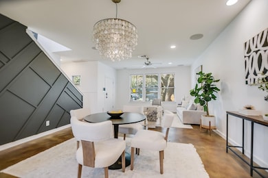 Dining space featuring visible vents, concrete fl