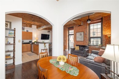 Archways frame a flex space, some use this area as