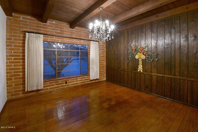 Plank wood floors in dining room
