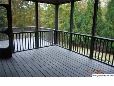 Screened and open deck over looking the pool